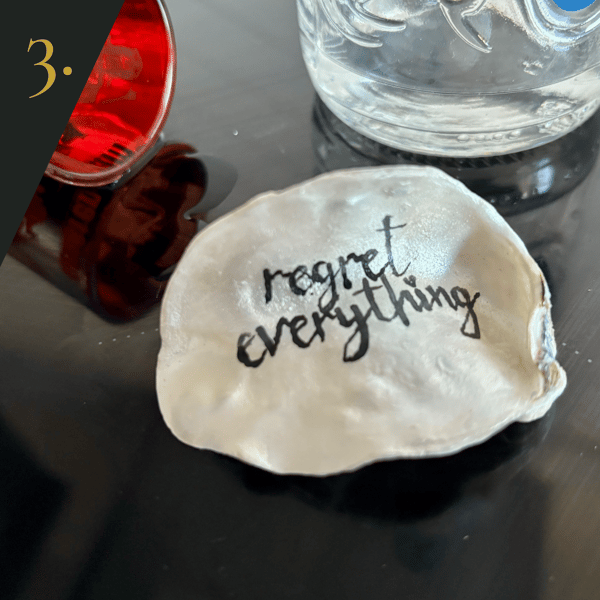 no.3 "regret everything" - from SHUCKED's hand-painted oyster shell collection