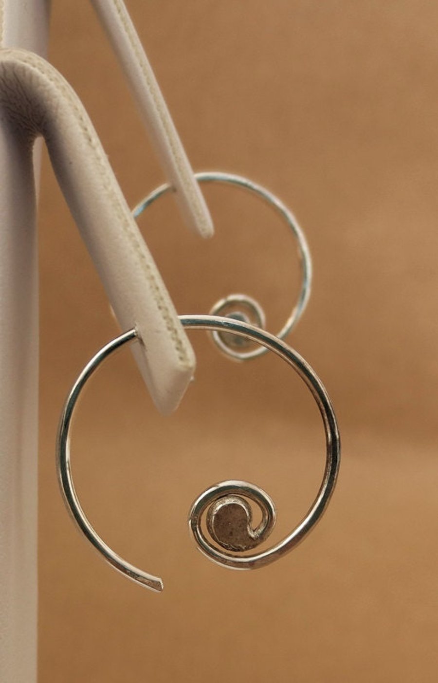 Spiral hoop earrings in sterling silver. made to order for you.