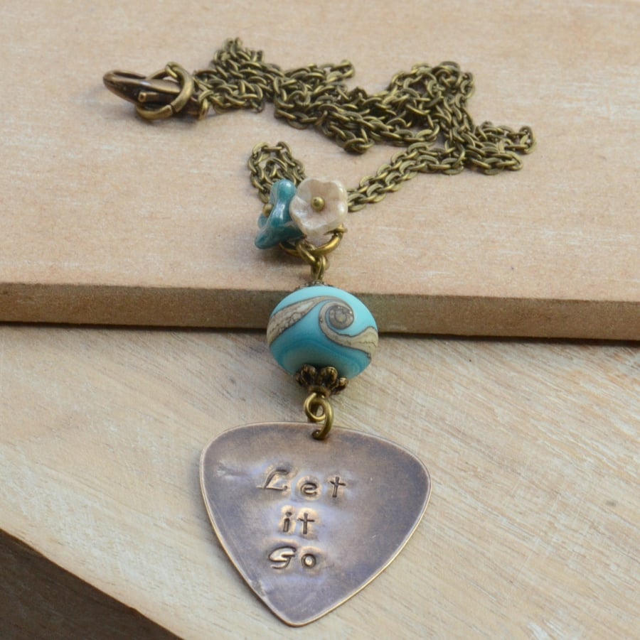 Let It Go Hand Stamped Vintaj Pendant with Turquoise Lampwork Glass Bead 
