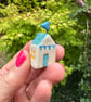 Teeny Hand-painted Ceramic Beach Hut with Flag - Image 4