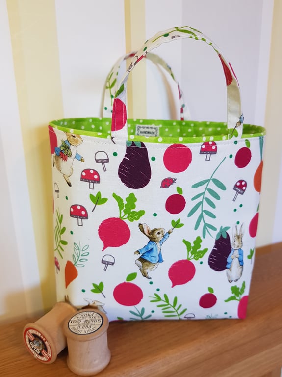 Reusable fabric gift bag; Peter Rabbit with his favourite veggies