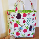 Reusable fabric gift bag; Peter Rabbit with his favourite veggies