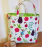 Reusable fabric gift bag; Peter Rabbit with his favourite veggies
