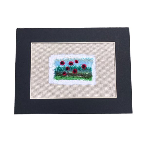 Miniature silk and wool poppy picture on cotton with linen backing, mounted