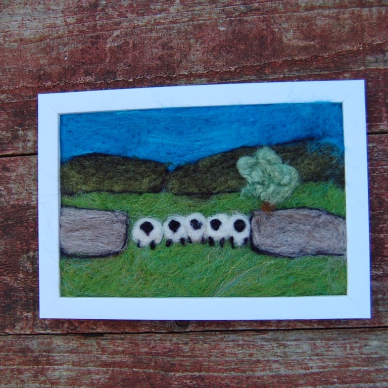 Sheep by a stonewall wool needlefelt picture.   White or Black frame