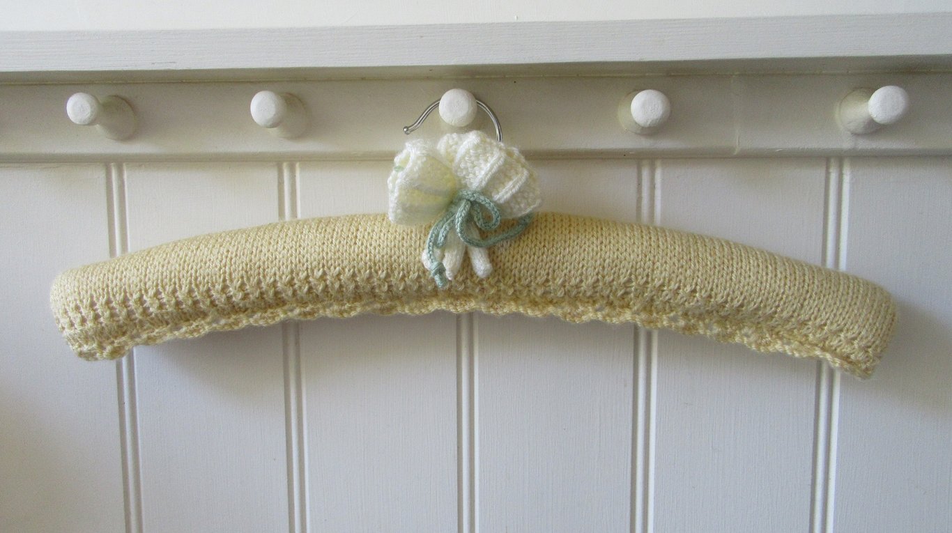 Coat hanger clothes hanger - primrose yellow  with crocus flowers