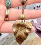 Sage green Czech glass and brass leaf pendant and earrings set, boho jewellery - Image 6