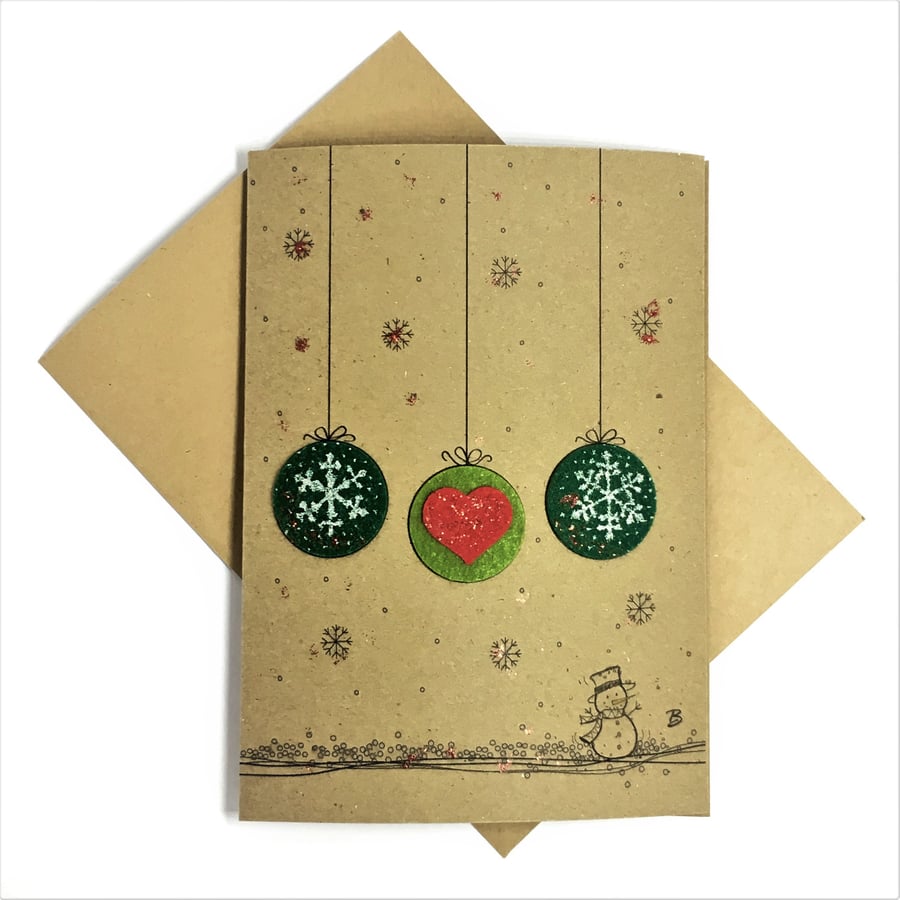 Three Christmas baubles and snowman design greeting card