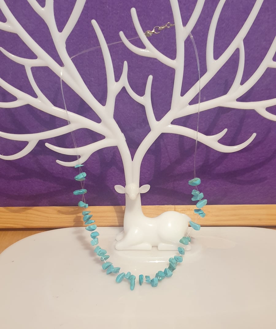 Floating turquoise gemstone necklace.