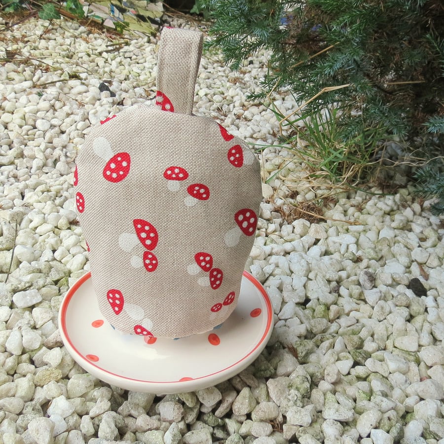 SALE!  A whimsical egg cosy.  Toadstools design.