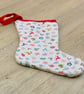 Hanging Christmas Stocking with scattered Christmas motifs. - Image 4