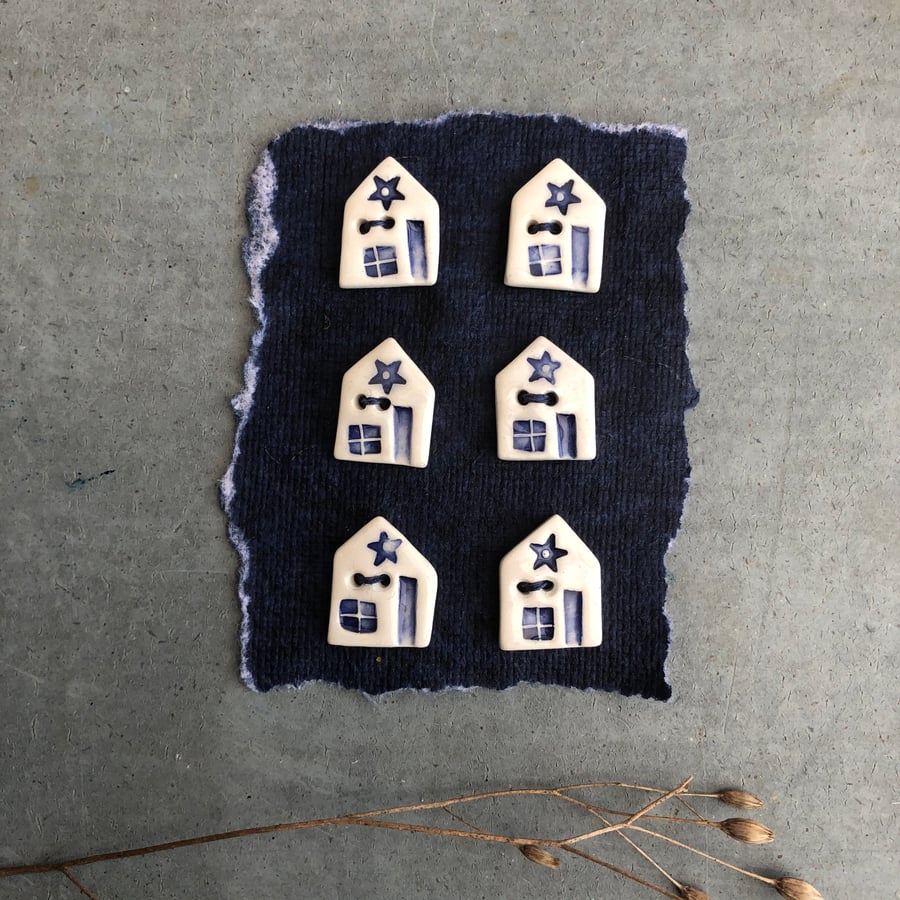 Ceramic house buttons .