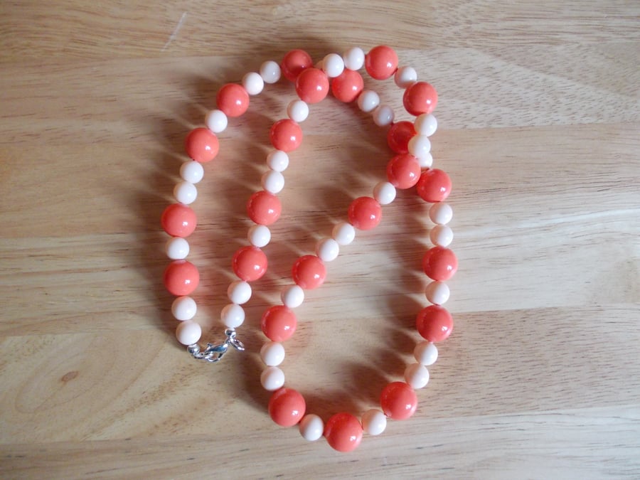 Coral and creamy peach coloured shell pearl necklace