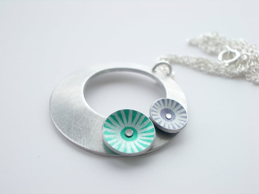 Circle pendant necklace in silver aluminium with purple and green discs