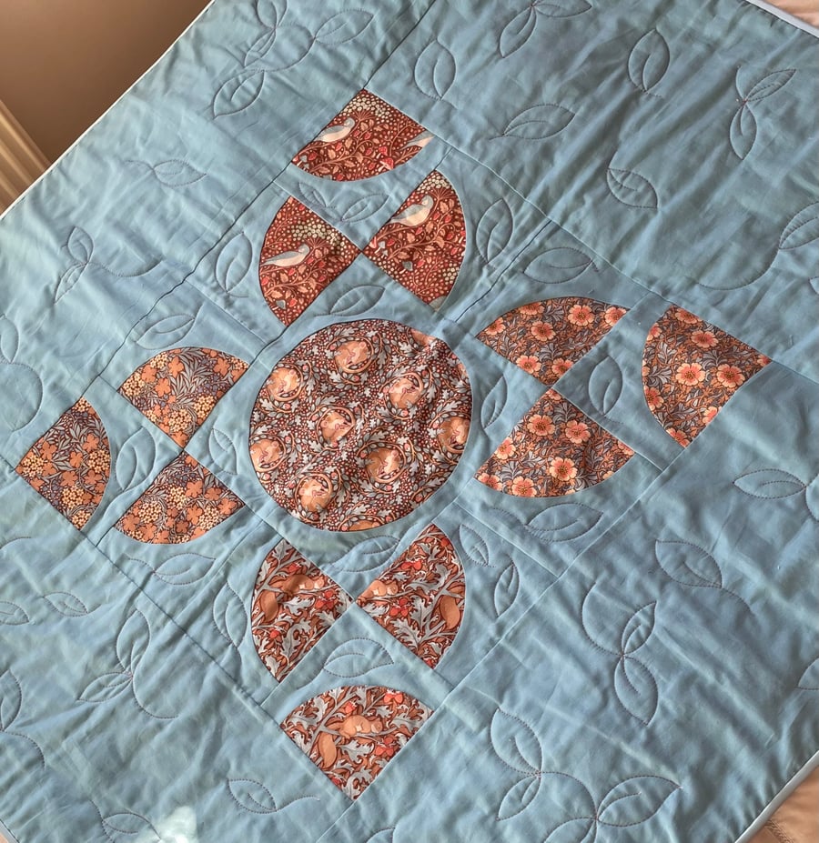 Lap quilt, free motion embroidered ‘Hibernation’ fabric, squirrels, mice, birds