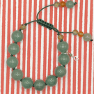 Macrame cord bracelet with green aventurine and orange agate stones