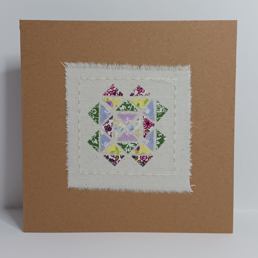 A Patchwork card of vintage fabrics in Spring colours - optional greeting