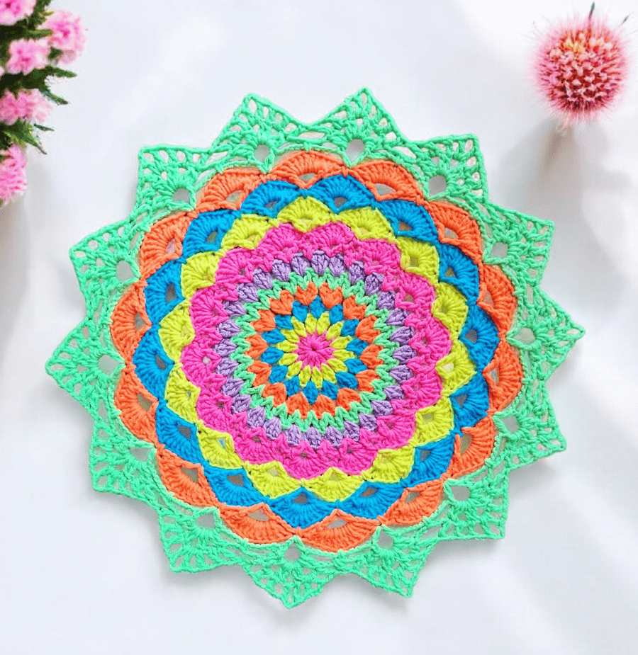Large, bright crochet mandala doily table mat
