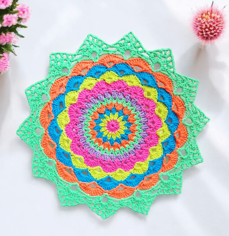 Large, bright crochet mandala doily table mat
