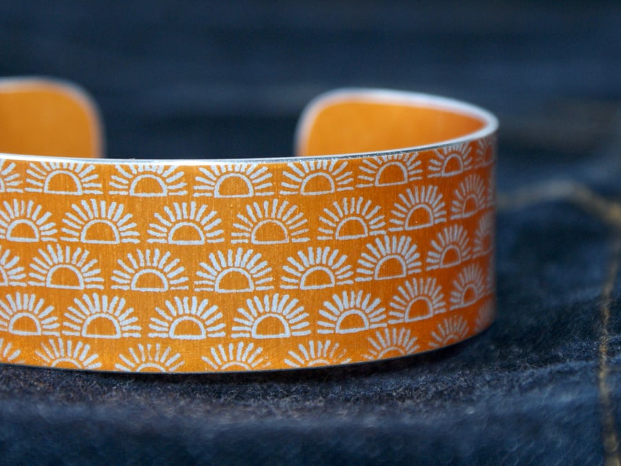 Geometric half sun pattern cuff bracelet orangey yellow