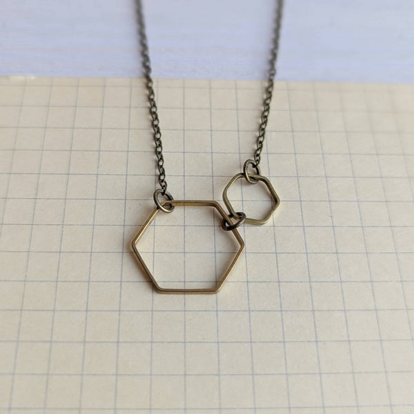 Golden Brass Hexagon Necklace: two hexagons, one larger, one smaller, Summer 