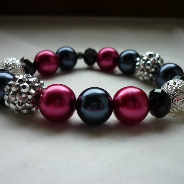 RASPBERRY, DARK GREY, BLACK AND SILVER BRACELET.  819