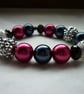 RASPBERRY, DARK GREY, BLACK AND SILVER BRACELET.  819 - Image 1