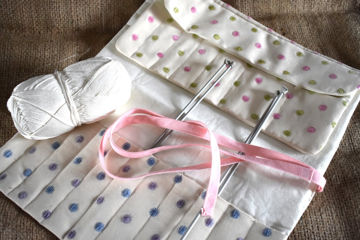 Fabric storage roll for knitting needles and crochet hooks. Ideal gift.