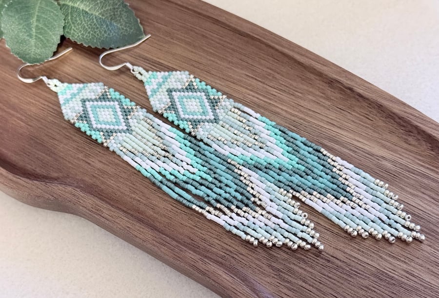 Long bohemian style fringe earrings in turquoise tones