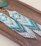 Long bohemian style fringe earrings in turquoise tones