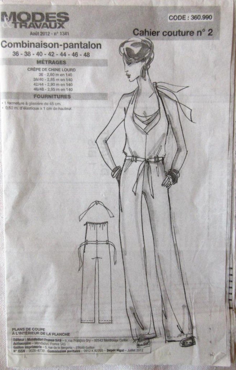 A French multi-size sewing pattern for a woman's halter-neck jumpsuit