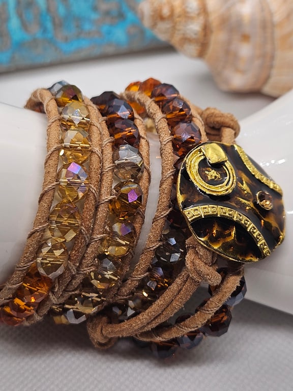 Bronze-orange leather triple wrap bracelet with abstract clasp