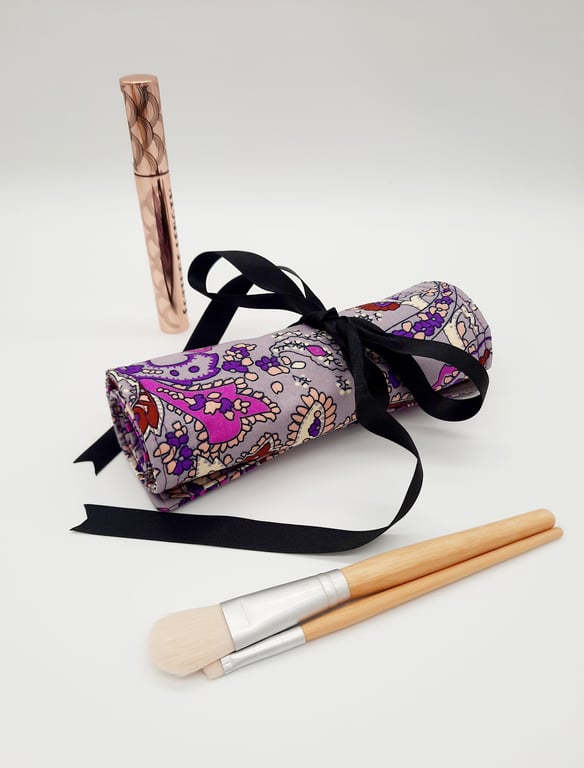 Purple makeup wrap with 12 pockets. Free UK delivery. 