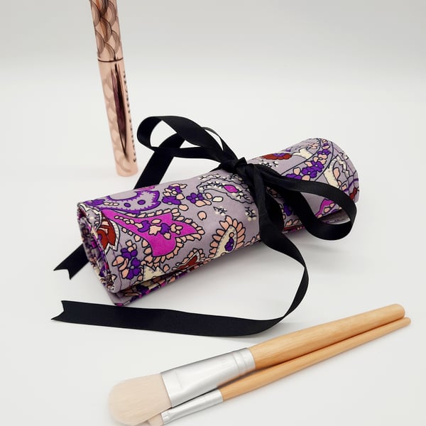 Purple makeup wrap with 12 pockets. Free UK delivery. 
