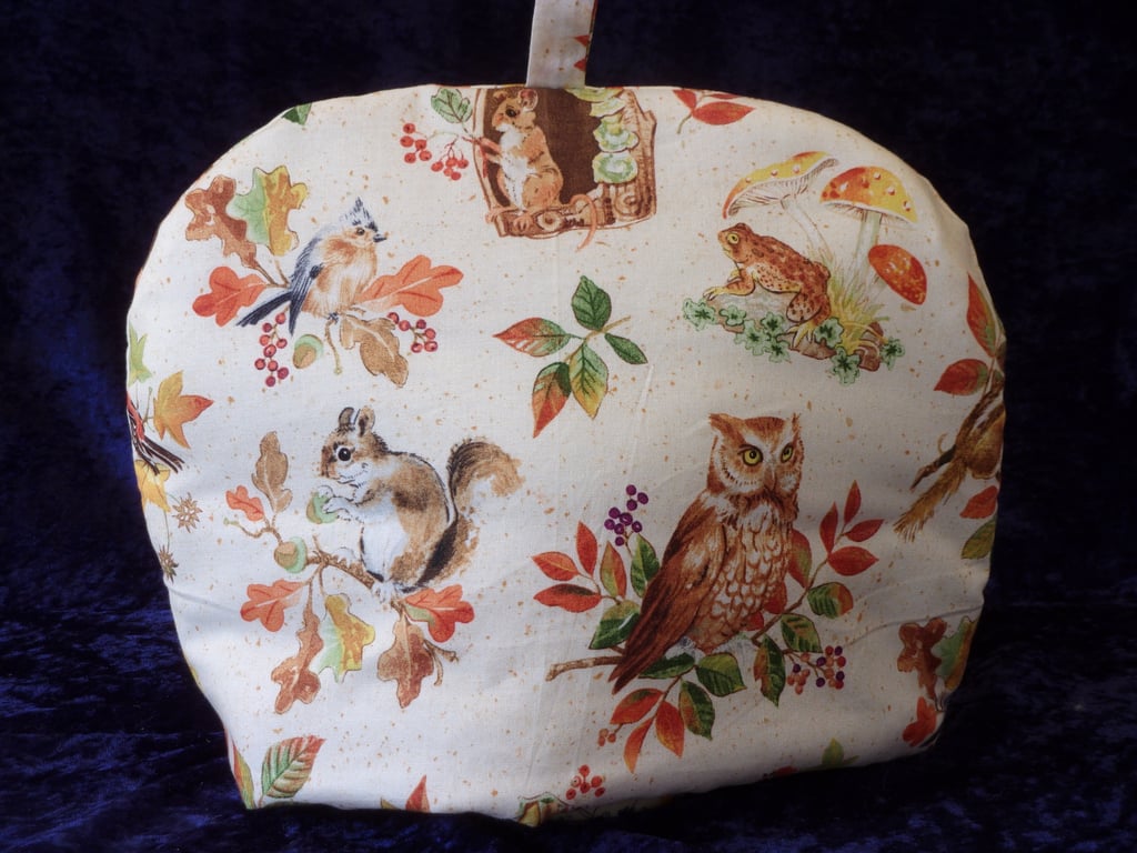 Tea Cosy for a 6 Cup Tea Pot with Owls and Squirrels on a Cream Background