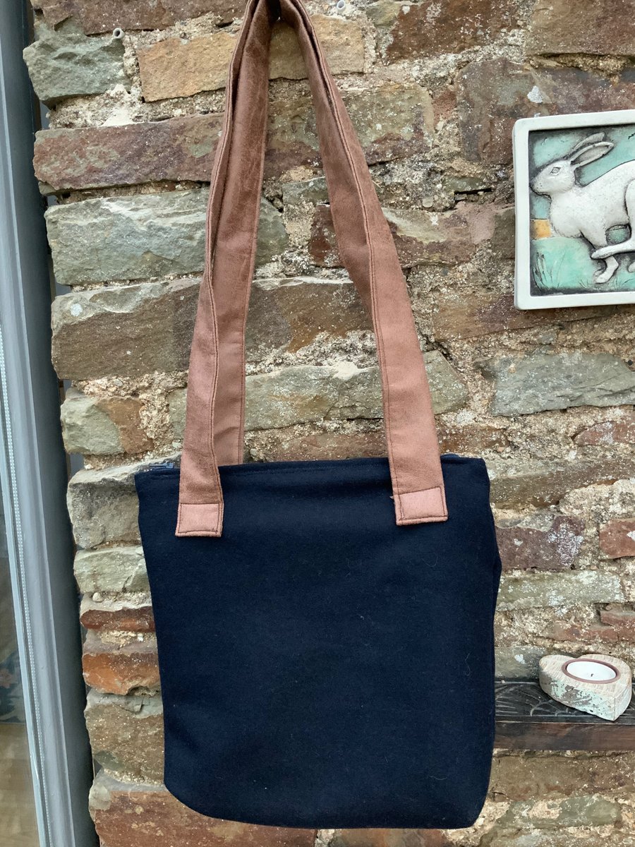 Handbag. Dark Blue wool fabric. Shoulder. 11” by 10”. Inside Pocket. Lined
