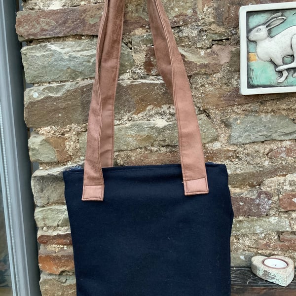 Handbag. Dark Blue wool fabric. Shoulder. 11” by 10”. Inside Pocket. Lined