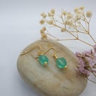 Gold plated earrings with beautiful faux sea glass beads sea green