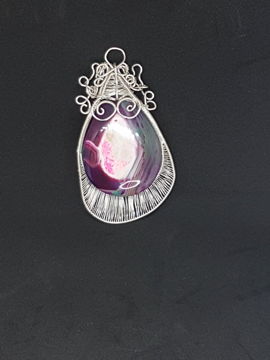 Oyster shell inspired wire wrapped pendant