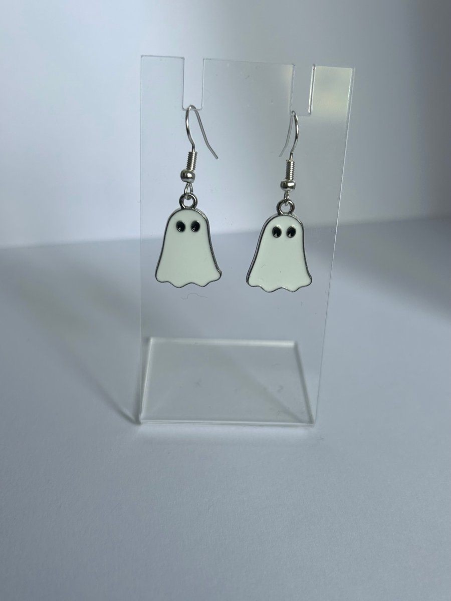Silver ghost drop down earrings 