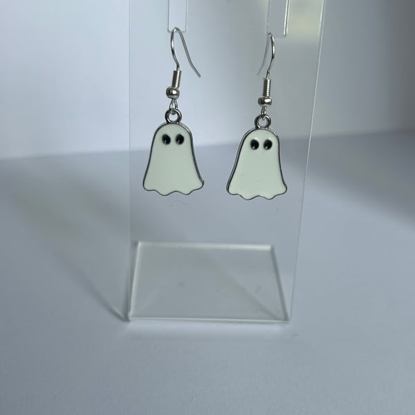 Silver ghost drop down earrings 