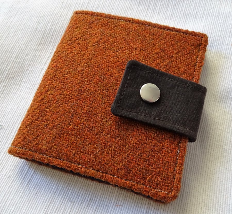 Slight second: Harris Tweed bifold wallet in burnt orange
