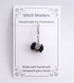 Tiny Glass Black Sheep Stitch Marker - Image 1