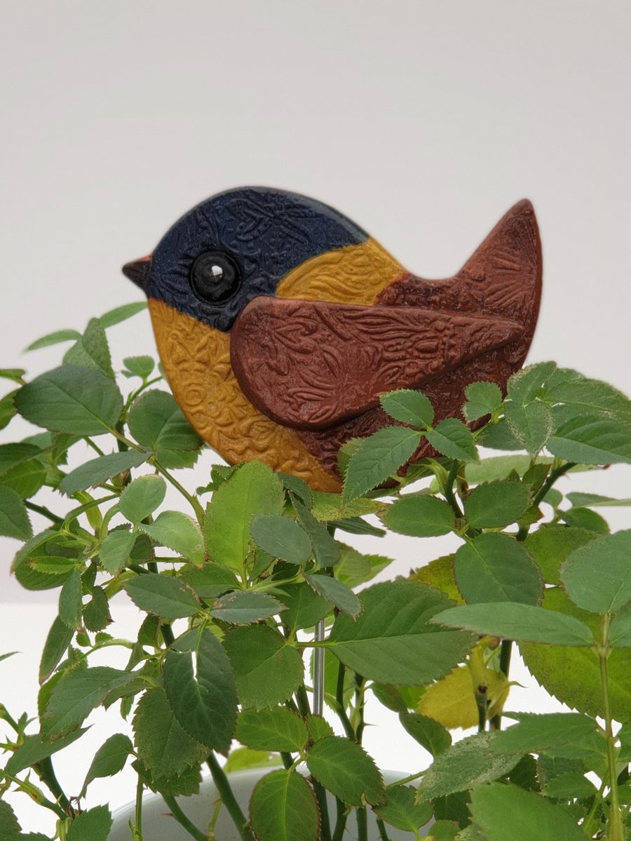 Clay bird pot plant stake