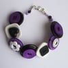 Black, white, purple button bracelet