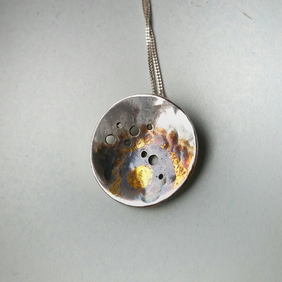 Unusual silver nature inspired necklace with gold