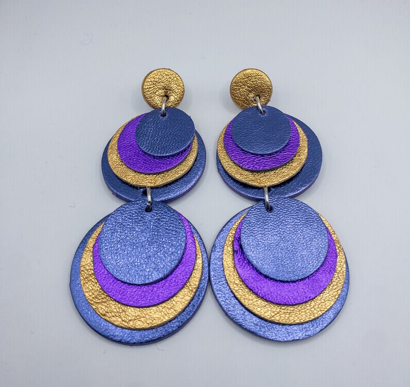 Large colourful circle lightweight statement leather earrings. Purple & Gold