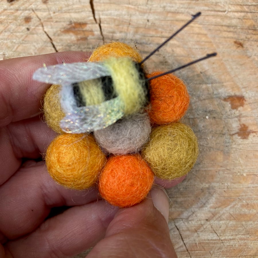 Fridge magnet, yellow and orange flower with needle felted bee