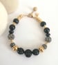 Black, gray & gold rhinestone beaded bracelet - Image 1