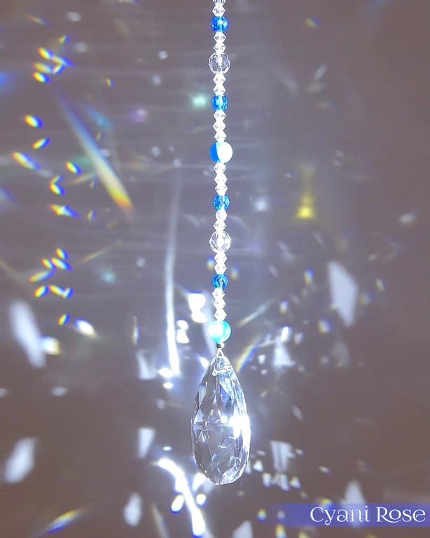 Suncatcher with pear prism and blue and clear beads handmade sparkly unique